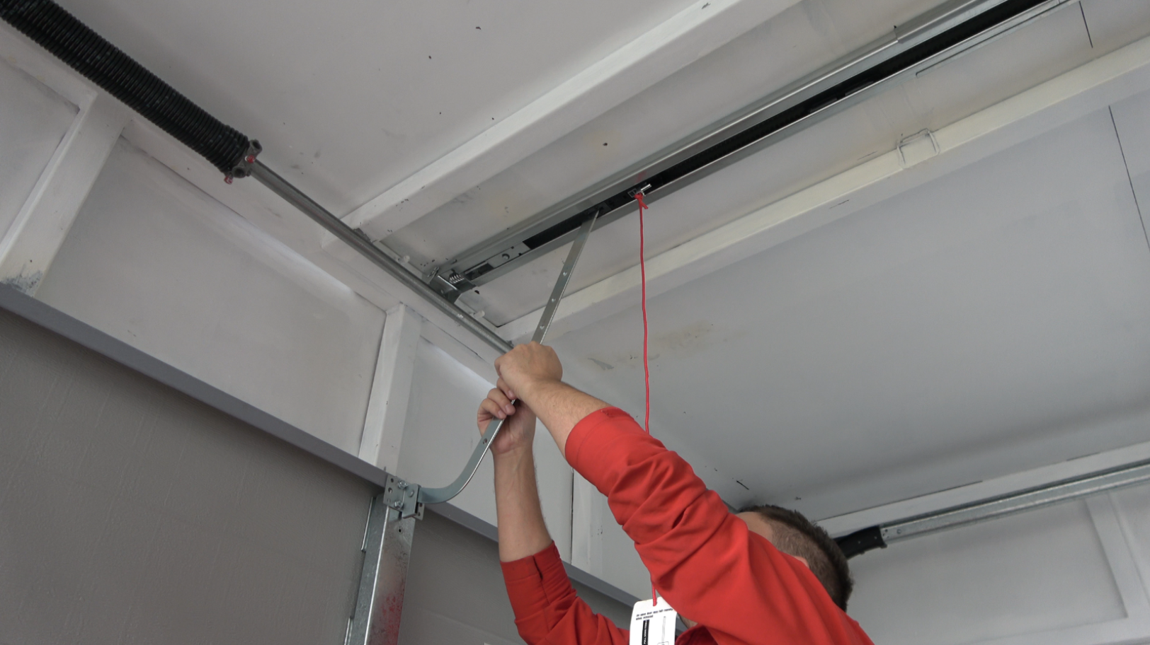 Installing the Door Bracket and Motor Arm